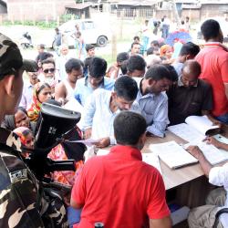 People queue up to check their names in final NRC list at Bhojkhowa in Tezpur on Saturday. Photo: UB Photos