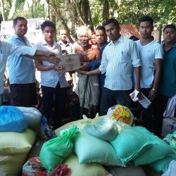 AJYCP members distribute relief materials to flood affected people at Teok