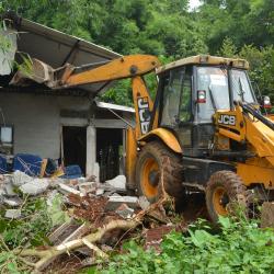 Assam Forest Department deployed 20 elephants and excavators to evict 1400 families from Amchang Wildlife Sanctuary on Thursday. Photo by UB Photos