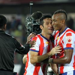 Fikru Tefera Lemessa of Atletico de Kolkata celebrates his goal with Luis Javier Garcia Sanz of Atletico de Kolkata during match 5 of the Hero Indian Super League between NorthEast United FC and Atletico de Kolkata held at the Indira Gandhi Stadium, Guwahati, India on the 16th October 2014.  Photo by: Deepak Malik/ ISL/ SPORTZPICS