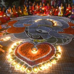 Students of Nalini Bala Devi Girls' Hostel, Cotton University lightning lamps on Thursday. Pix by UB Photos.