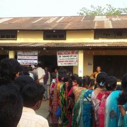 Voters lined up in fromt of a model polling station at Dudhnoi HIgh School