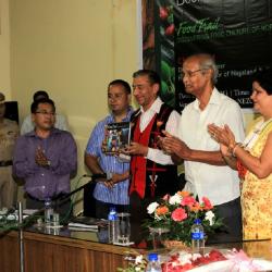 Nagaland Governor Ashwani Kumar releasing the book. Flanked by Som Kamei (L), Aiyushman Dutta (2L) and Prof AC Bhagawati (R)