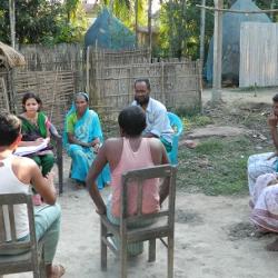 Don Bosco University students interact with villagers on mental health.
