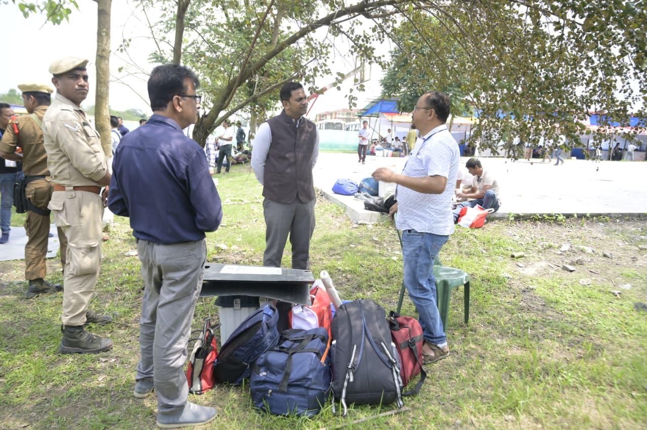 Polling officials on the move, carrying the spirit of democracy to every booth.
