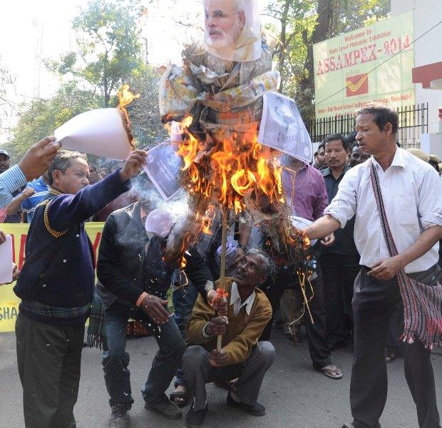 KMSS activists burnt Prime Minister Narendra Modi's effigy protesting BJP's view on the Northeast 