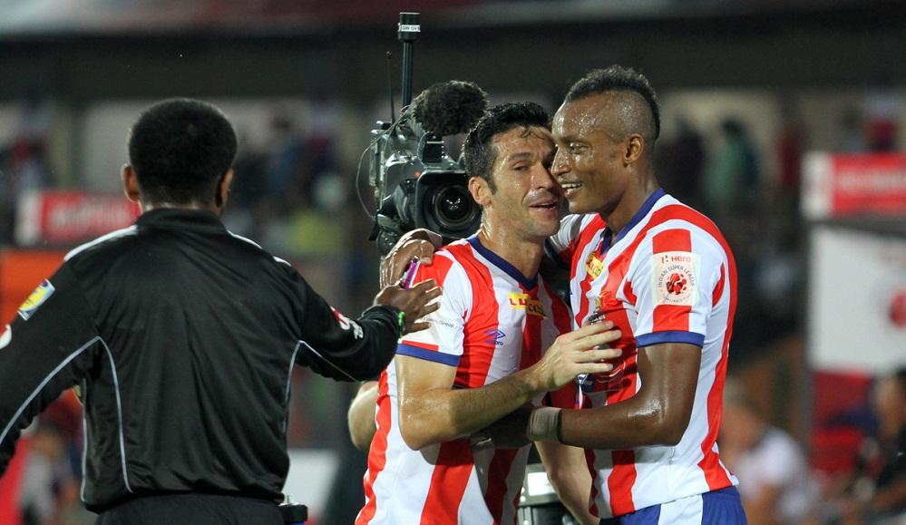 Fikru Tefera Lemessa of Atletico de Kolkata celebrates his goal with Luis Javier Garcia Sanz of Atletico de Kolkata during match 5 of the Hero Indian Super League between NorthEast United FC and Atletico de Kolkata held at the Indira Gandhi Stadium, Guwahati, India on the 16th October 2014.  Photo by: Deepak Malik/ ISL/ SPORTZPICS