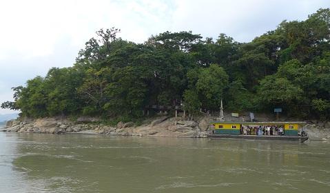 Approaching Umananda temple..