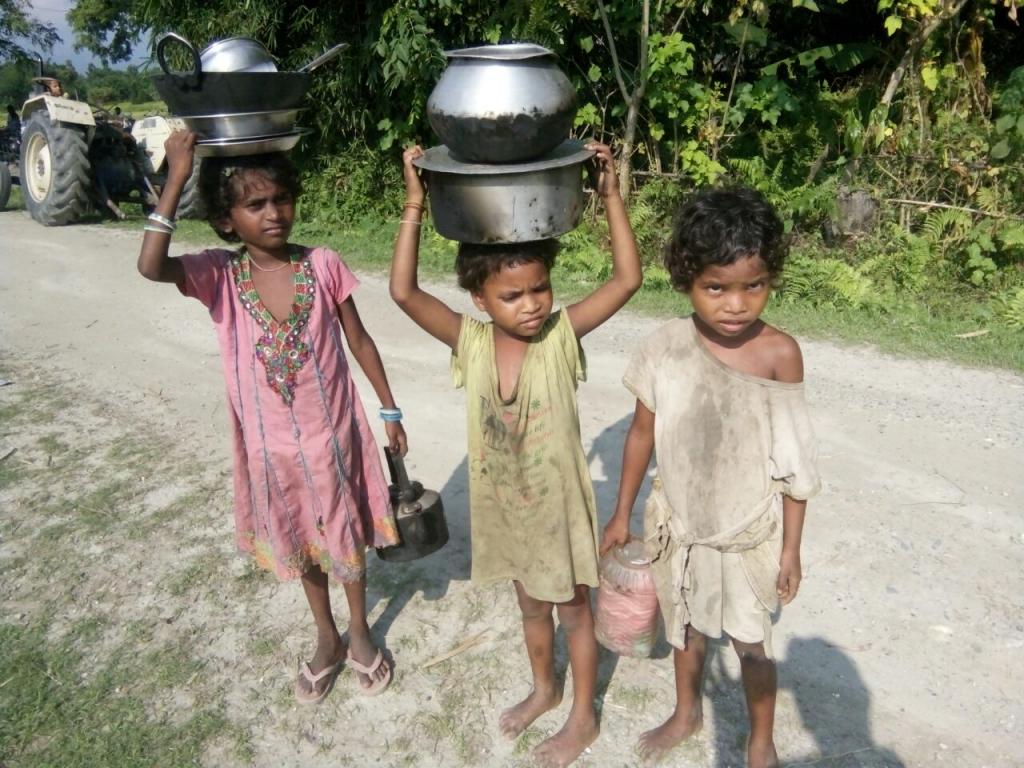 Childrens struggling for everyday livelihood at remote Indo-Bhutan border village on Thursday.