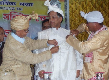 Chief Minister of Assam Tarun Gogoi being felicitated