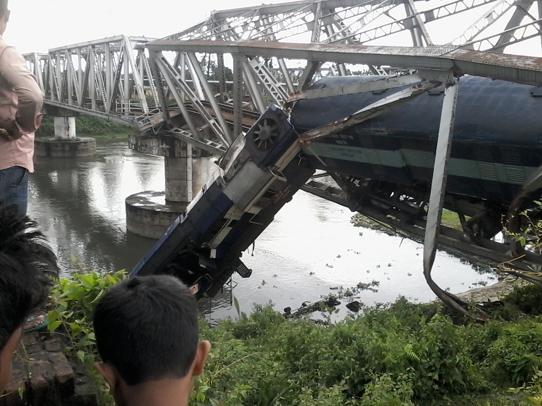 Train slips into river:2 hurt