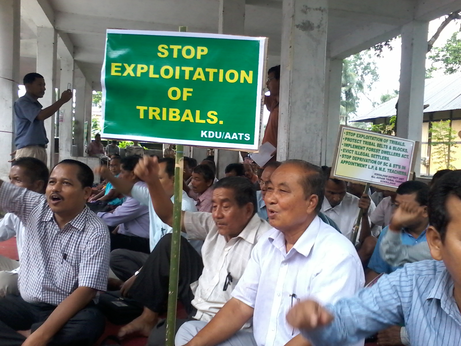 Tribal sangha stages dharna