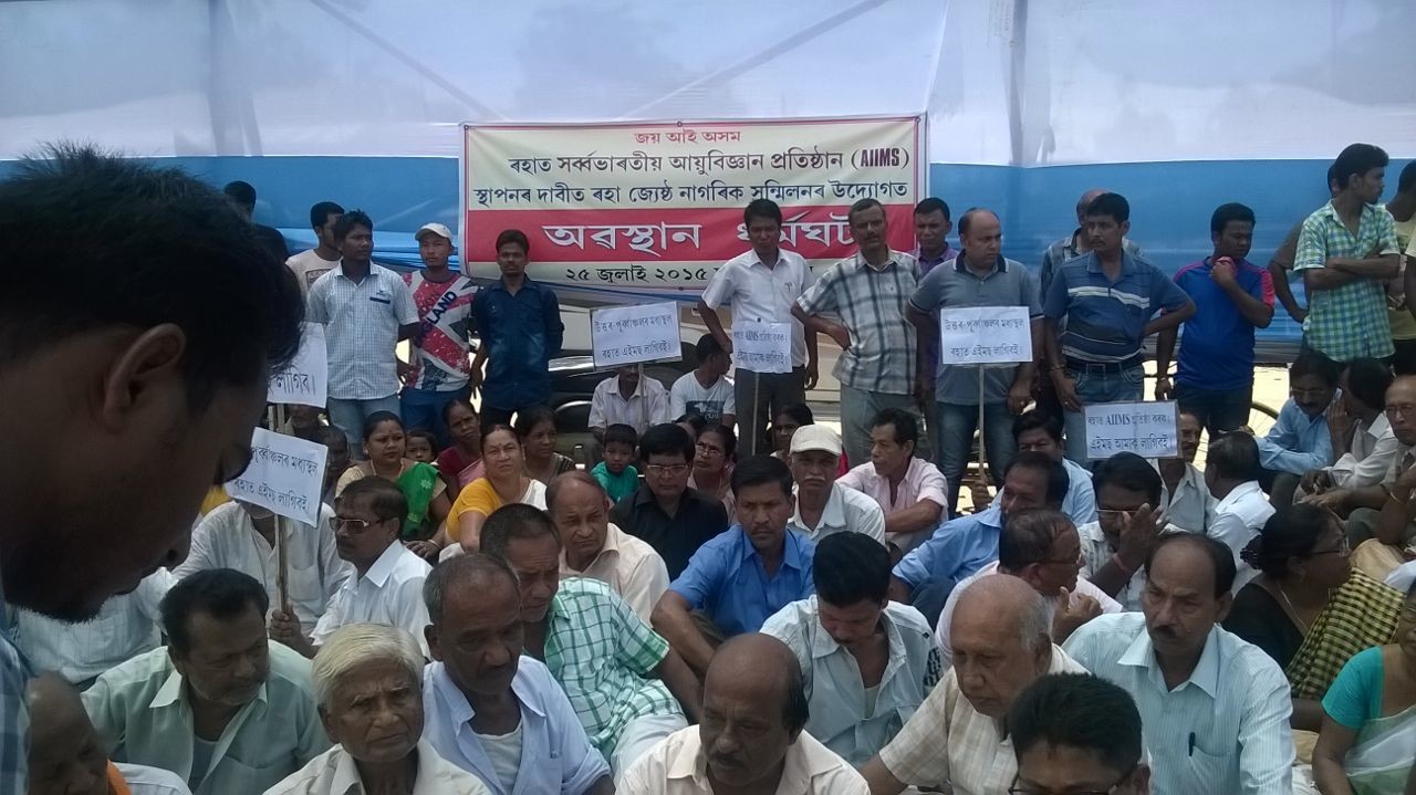 Sit in stir for AIIMS at Raha