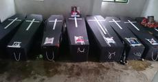  Bodies in coffins for protest