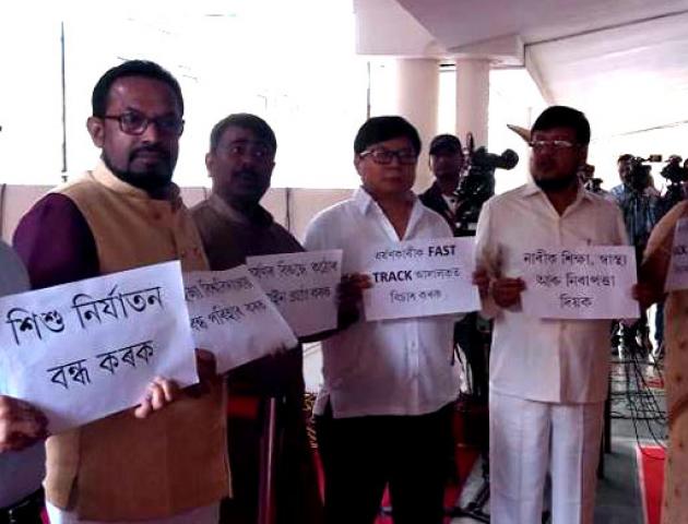 Cong stages walk out in assembly