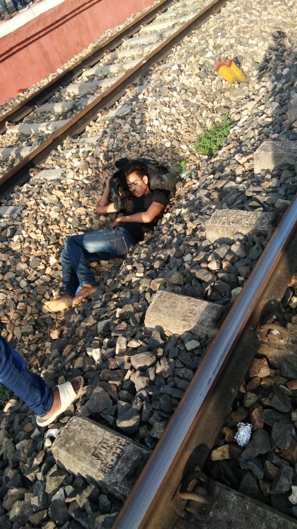 Boy jumps off running train